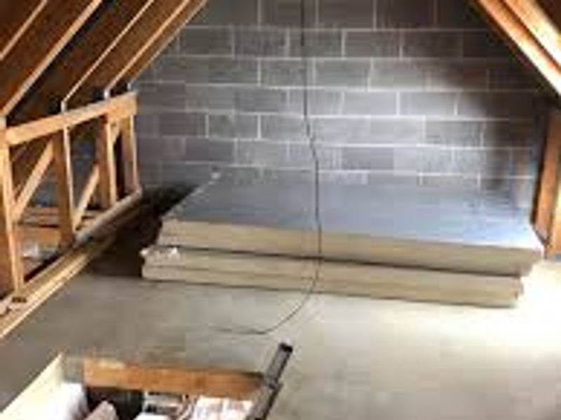 Boarded loft with enlarged hatch and wooden ladder